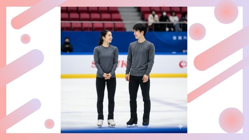 　- アイスリンクサイドで並んで笑顔を交わす、親密そうな日本の男女フィギュアスケーター。