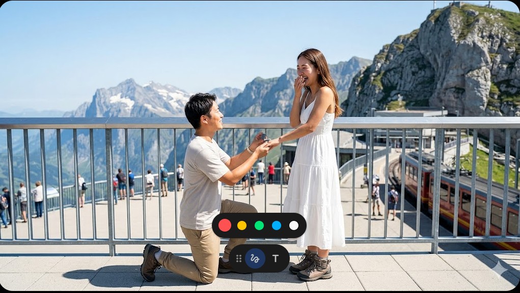 スイスの険しい山々を背景にした展望台で跪いてプロポーズをする男性と喜ぶ女性